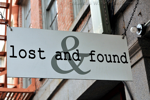 Located on Charles Street in the French Quarter, a sign for the Lost and Found women's clothing store. New Orleans.