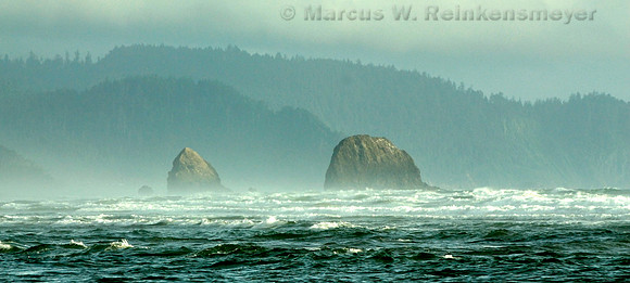 Sea stacks on a misty morning at Cannon Beach, Oregon.
