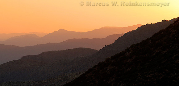 Viewed from the summit of Four Peaks Mountain, distant mountain ranges at sunset.  Arizona landscapes.