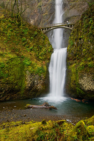 The Benson Bridge offers a dramatic view of the majestic Multnomah Falls, located 30 miles from Portland, Oregon.