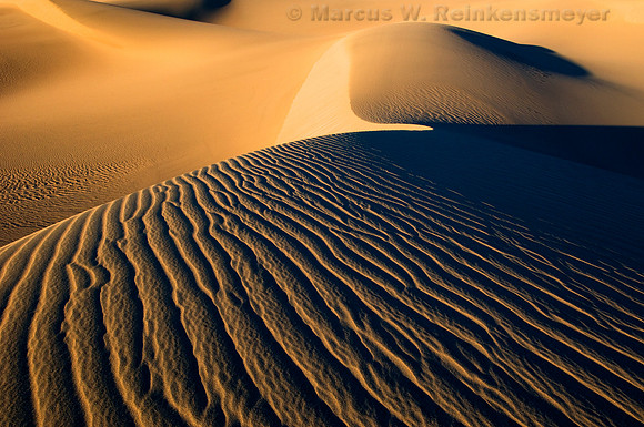 Minimalistic abstract patterns of nature, shaped by endless winds and rains at the Mesquite Flat Dunes, Death Valley National Park, California.