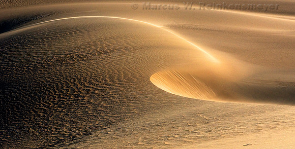 High winds and blowing sands in a sand storm at Mesquite Flat Dunes, located near Stove Pipe Wells in Death Valley National Park, California.