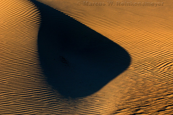 Minimalistic abstract patterns of nature, shaped by endless winds and rains at the Mesquite Flat Dunes, Death Valley National Park, California.