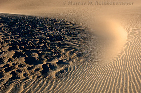 Minimalistic abstract patterns of nature, shaped by endless winds and rains at the Mesquite Flat Dunes, Death Valley National Park, California.