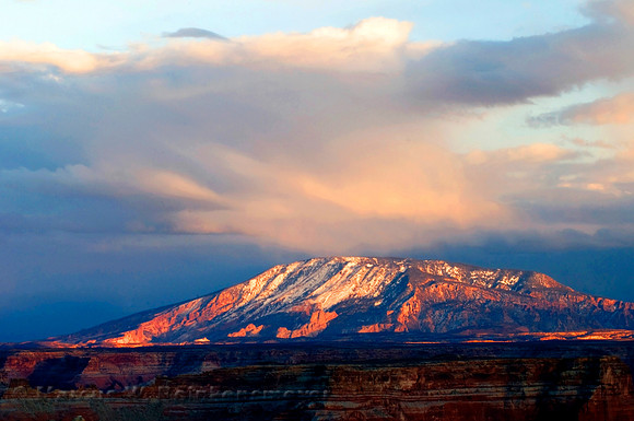 Storm on the mountain horizon, viewed from Alstrom Point, Lake Powell, Utah.