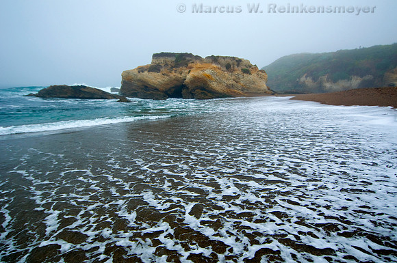Surf Laced Misty Shoreline at Montana de Ore State Park, California.