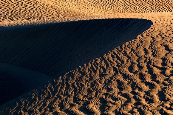 Minimalistic abstract patterns of nature, shaped by endless winds and rains at the Mesquite Flat Dunes, Death Valley National Park, California.