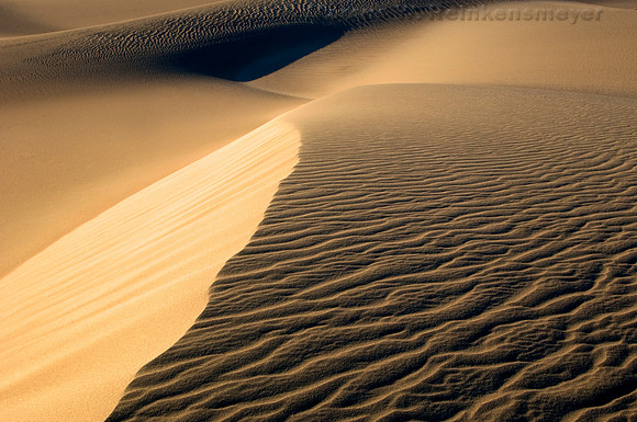 Minimalistic abstract patterns of nature, shaped by endless winds and rains at the Mesquite Flat Dunes, Death Valley National Park, California.
